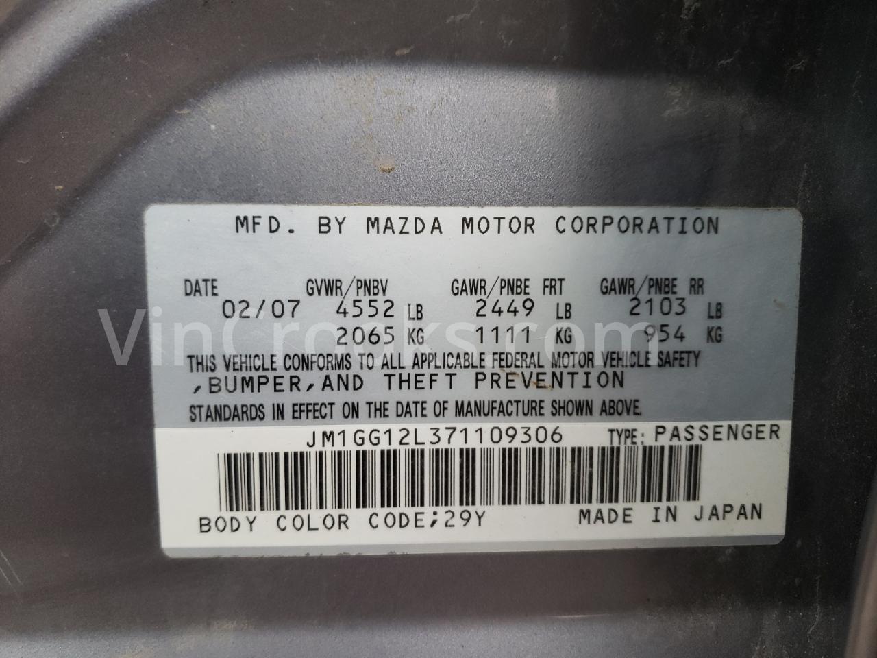 JM1GG12L371109306