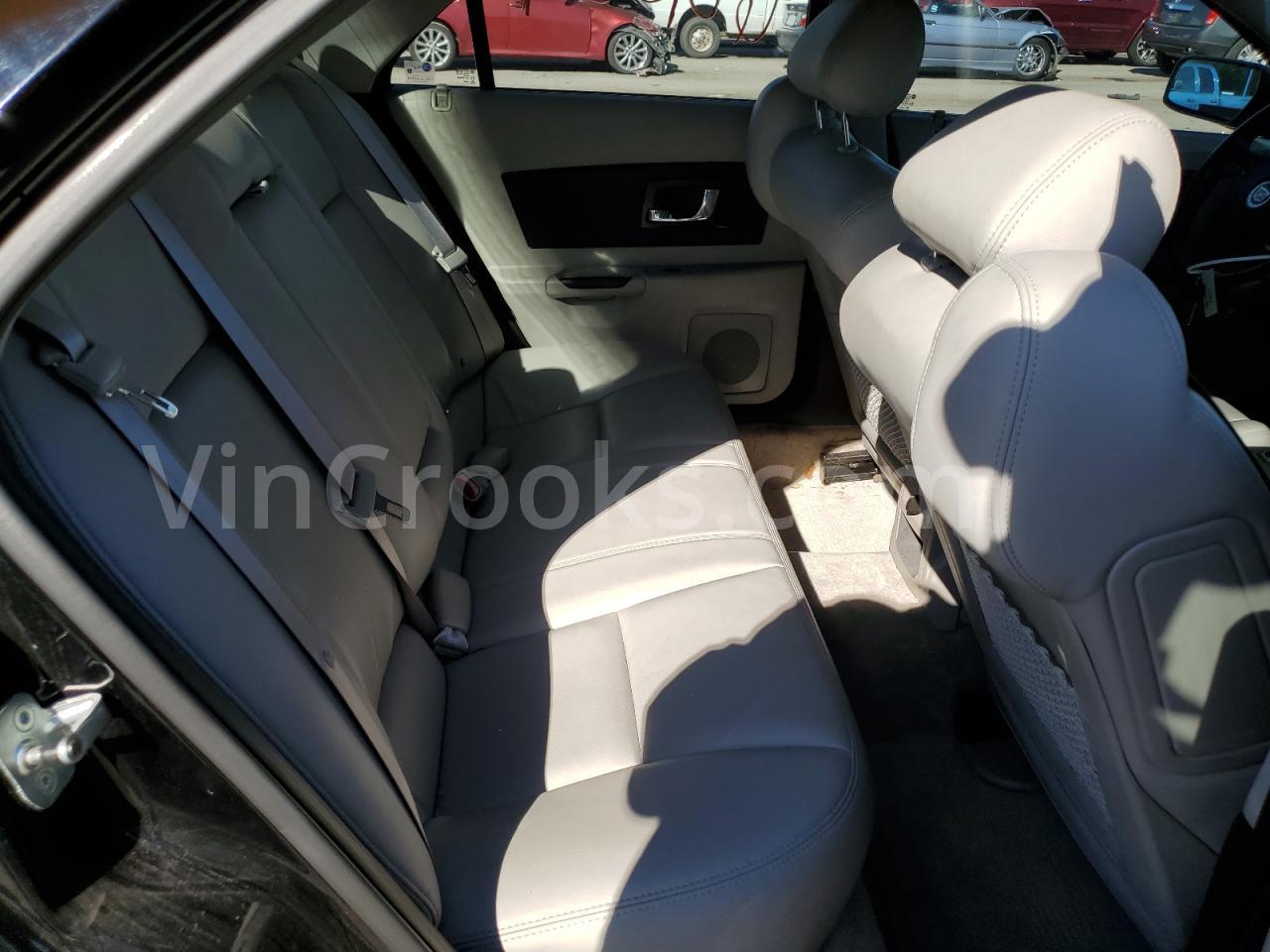 1G6DM57T260199115