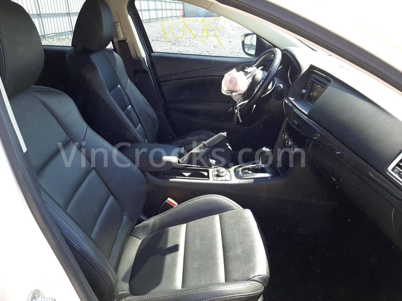 JM1GJ1V65E1159838
